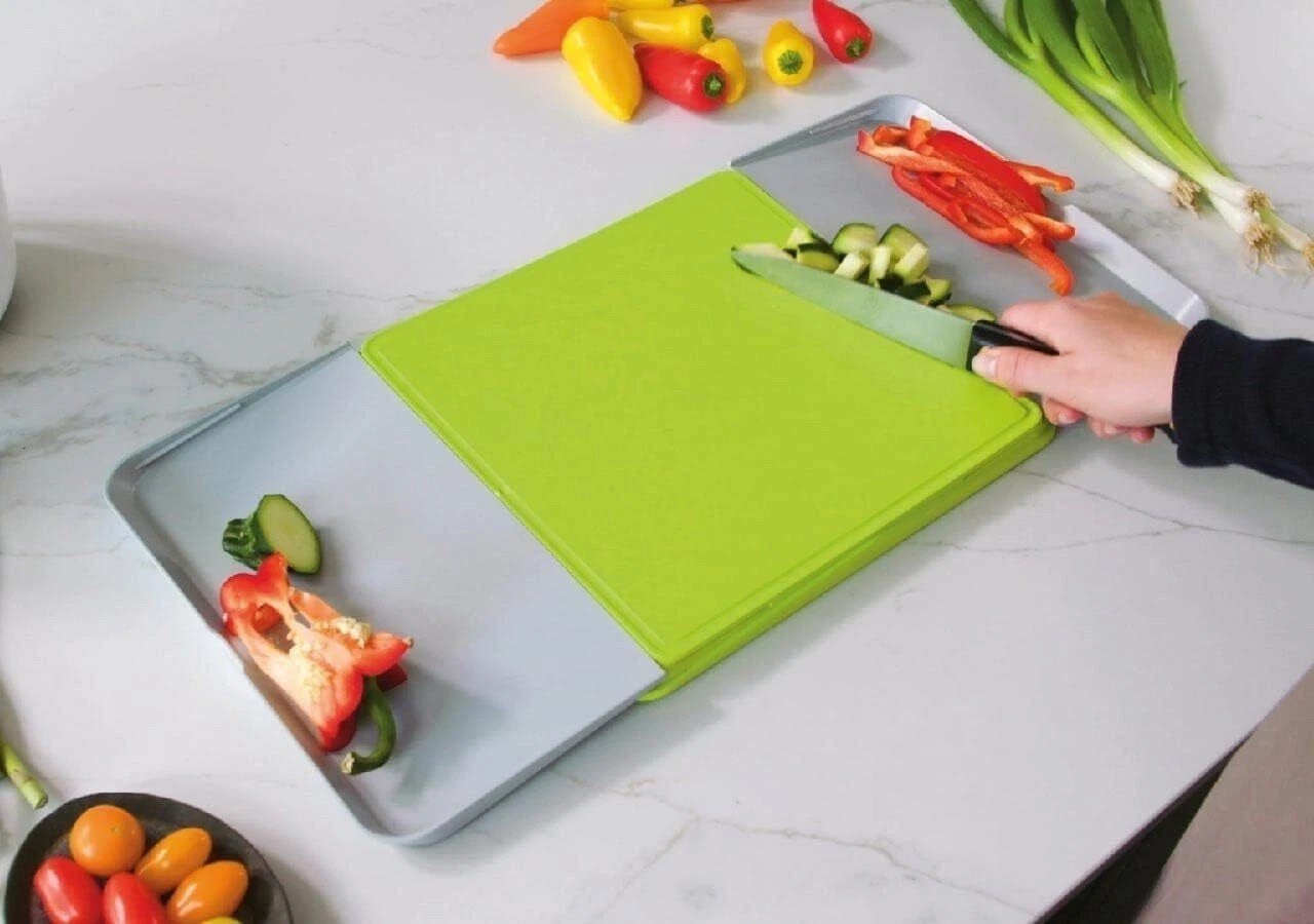 Addis Chop & Swipe Chopping Board Space Saving Design with easy pour side trays