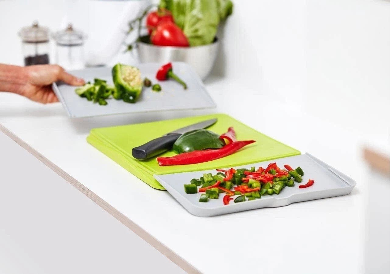 Addis Chop & Swipe Chopping Board Space Saving Design with easy pour side trays